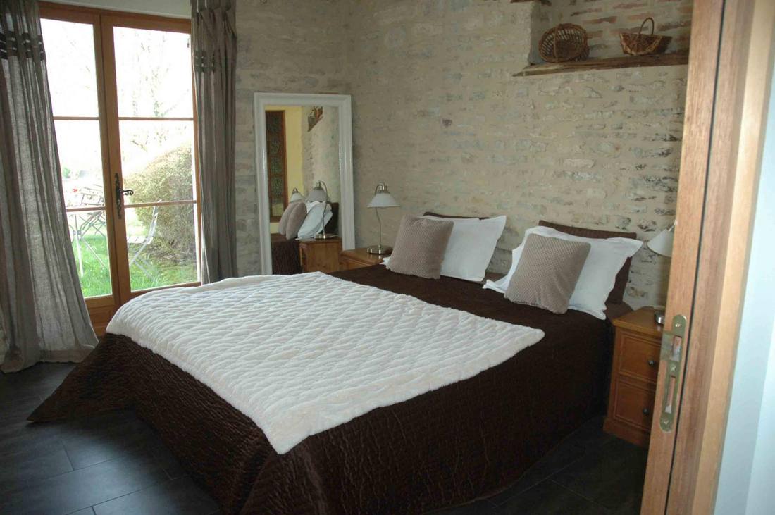 Chambre ouverte sur le jardin